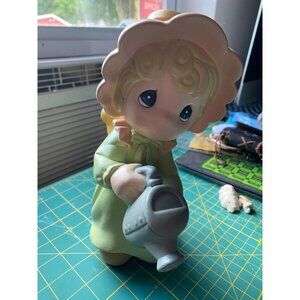 Precious Moments 2005  Figurine Girl with watering can. SOLD